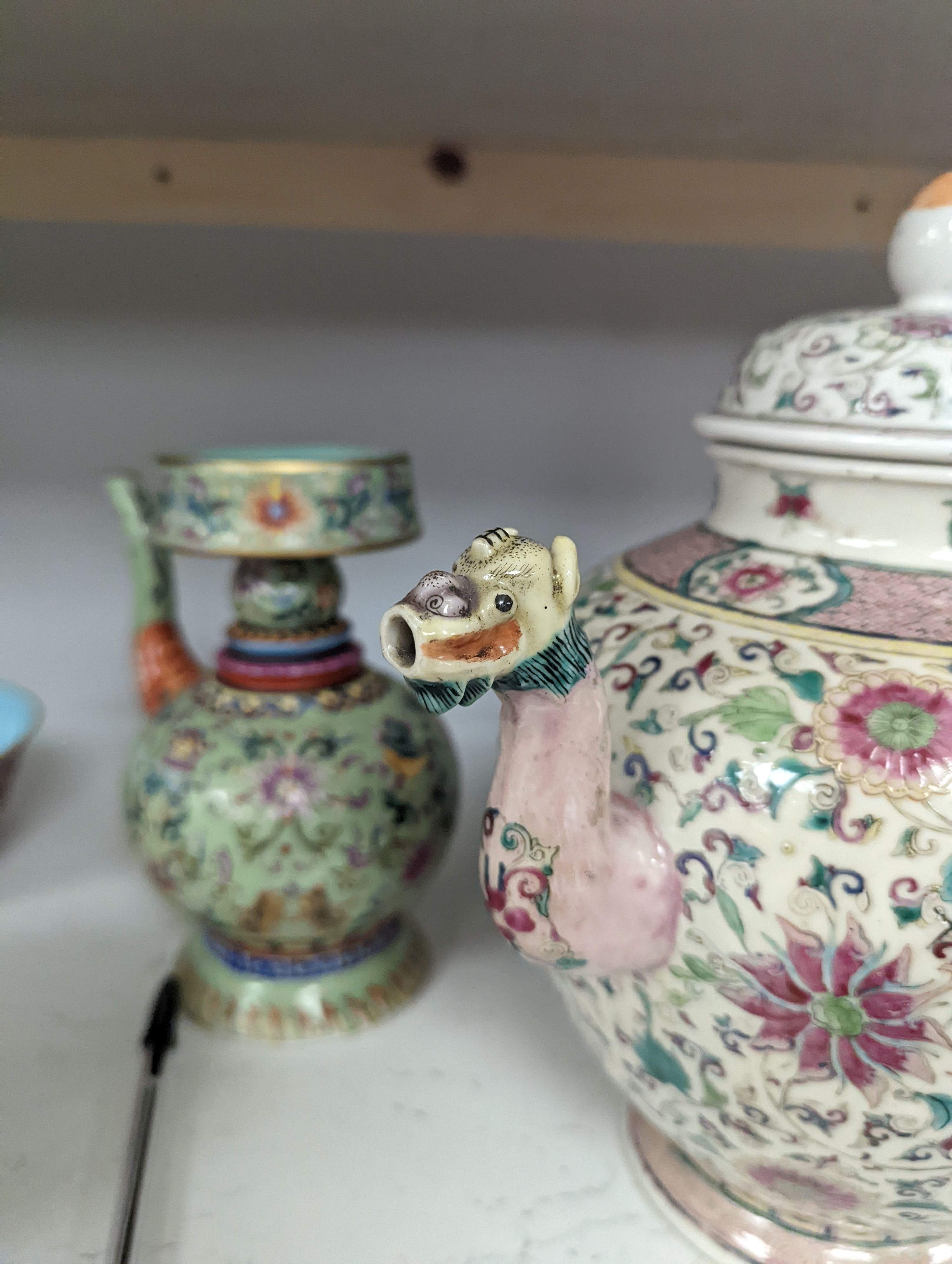 A large 19th century Chinese famille rose wine pot, and another wine pot, tallest 27cm